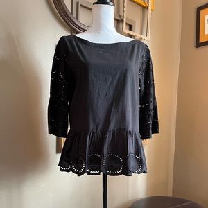 Sweet eyelet top from LOFT. Black. Size S. Eyelet sleeves and peplum trim.